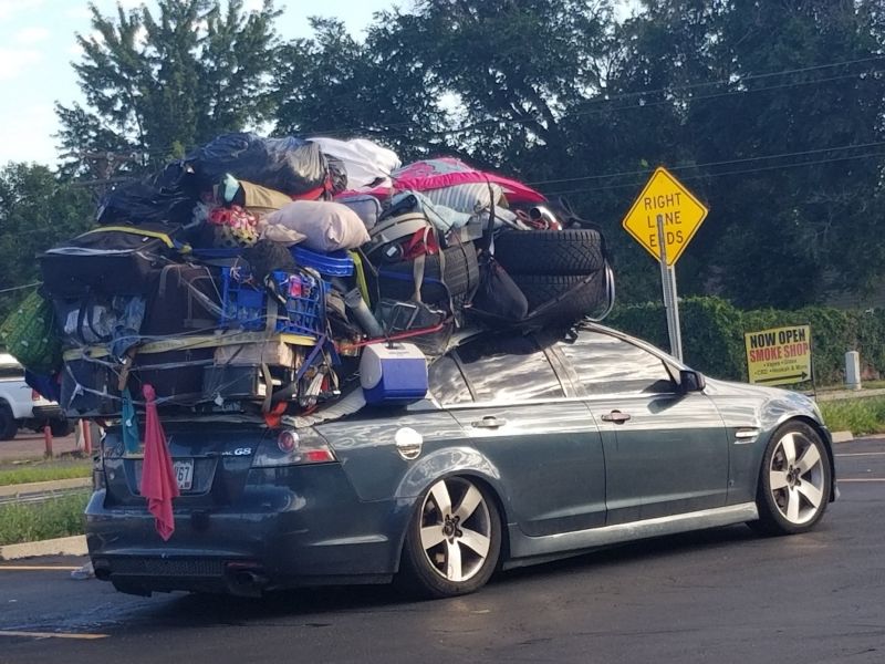 Had to Share This
a sad thing that he is I presume homeless.

I wonder since where he is parked if the police pulled him over? cause he was just resting on the pavement.
